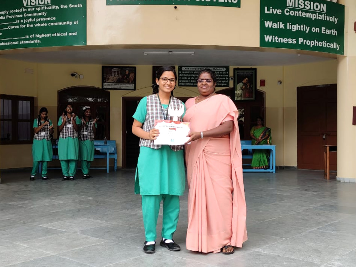 Madhumitha R of XII BM won third place in Quil Quest(Creative Writing) conducted in Holy Angels School